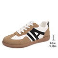 Women's retro colour matching lace-up jogging shoes with platform heel and cross-strap detailing in black, grey, and khaki options