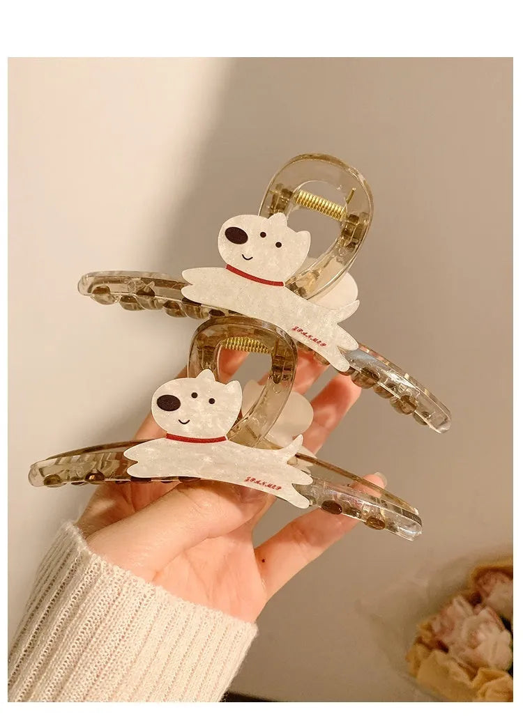 Cartoon puppy design hair barrettes in beige and brown colours with grip mechanism
