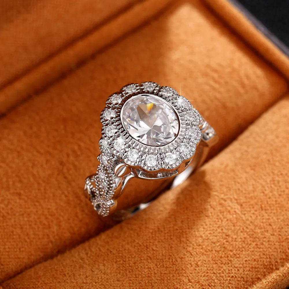 Women's copper ring with white gold plating and full round zircon stone setting in a geometry shape.