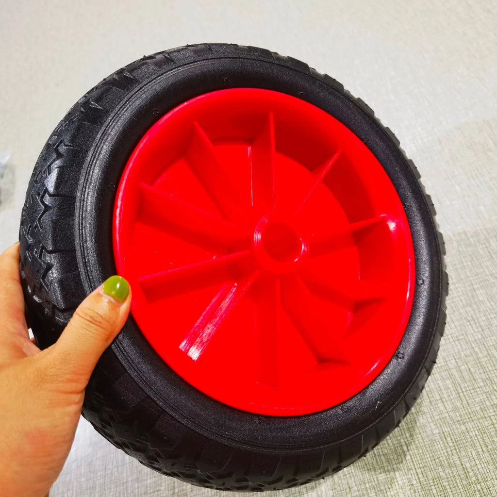 Foldable aluminium kayak cart with wide rubber tyres and a platform, shown folded and assembled.
