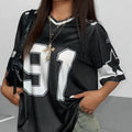 V-neck loose T-shirt with large printed numbers in street style design