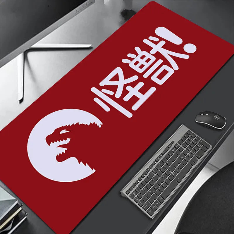 All black extra long mouse pad with precision overlock stitching on a desk