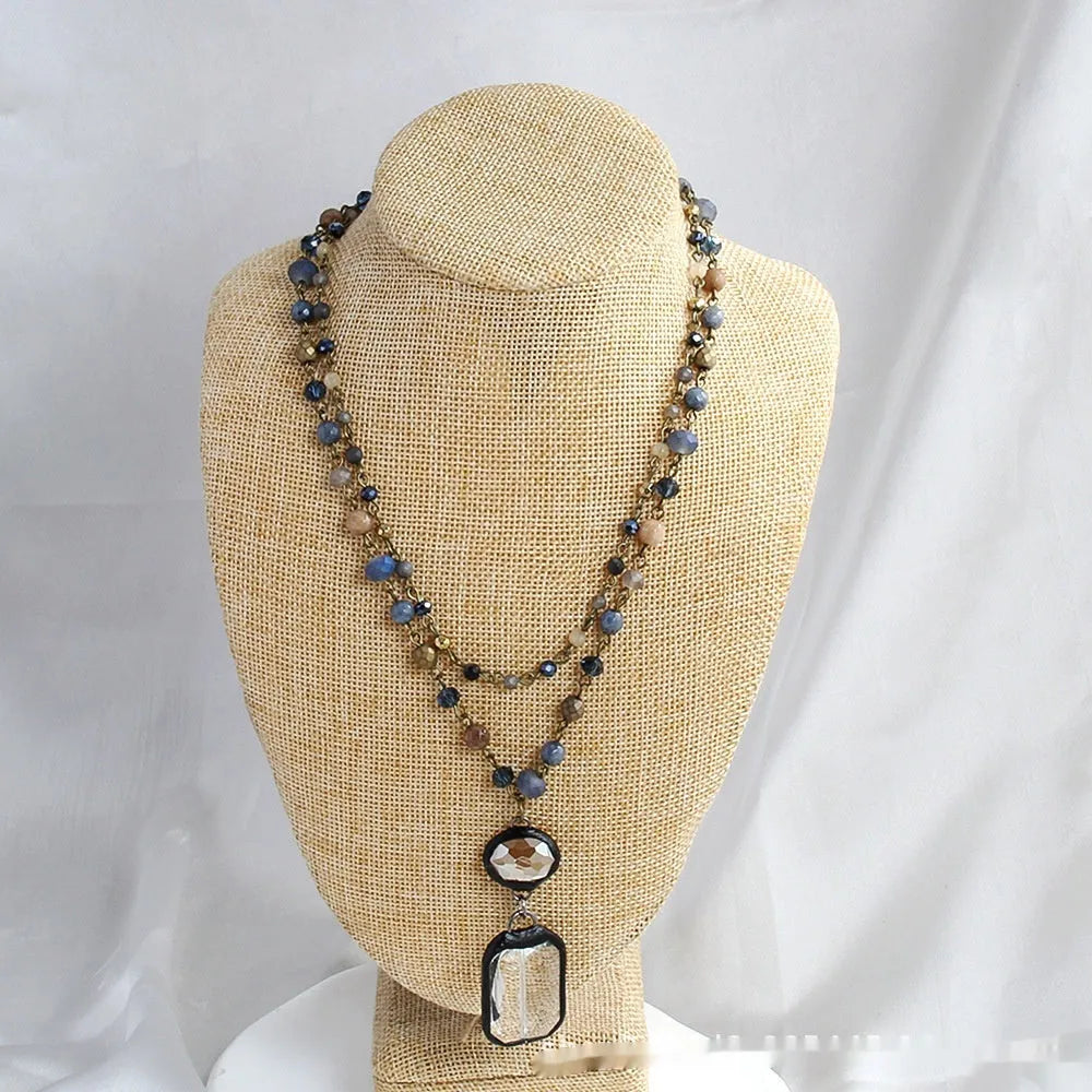 Tribal style two-layer necklace with glass pendant and semi-precious stones on adjustable chain