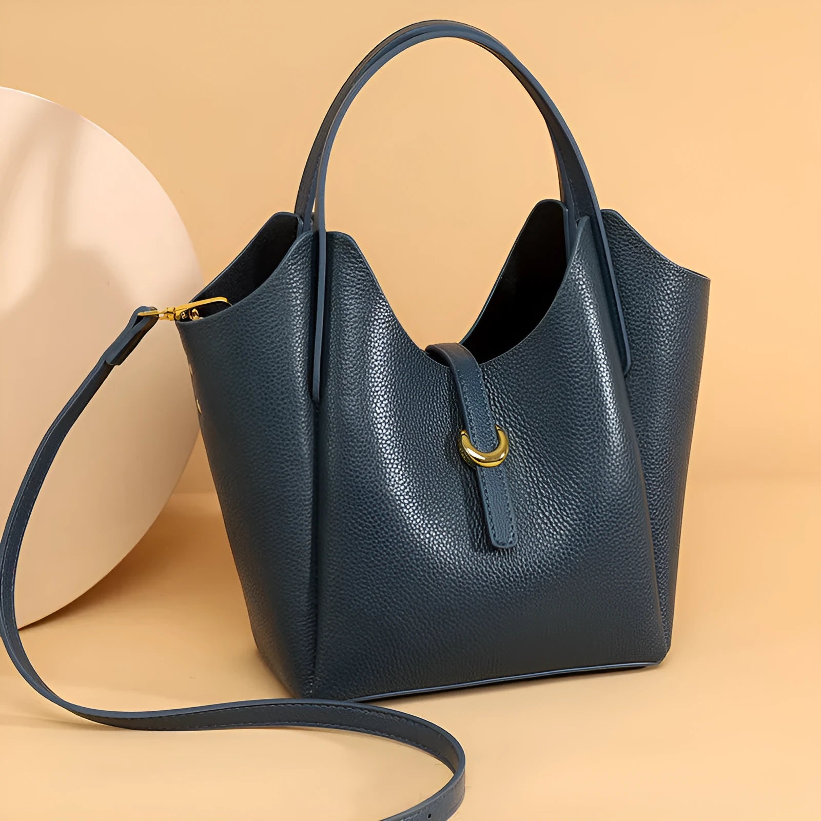 Genuine leather women's hand held retro bucket bag in beige with top handle