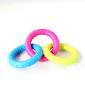 TPR plastic three-chain dog molar chew toy with raised cleaning nubs, shown in a random colour.