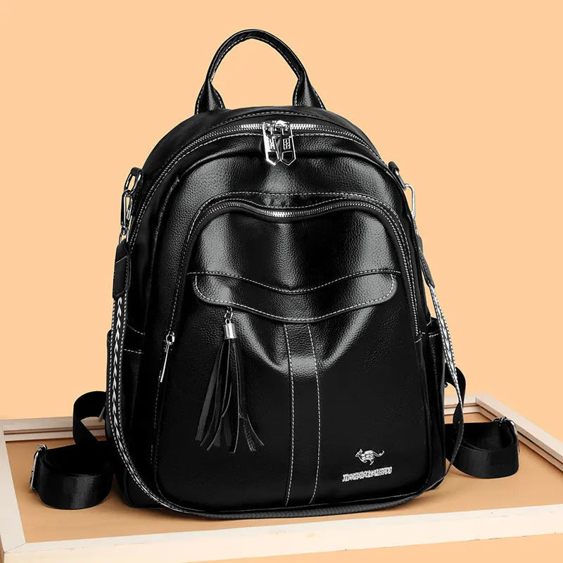 Genuine leather tassel backpack in khaki with fringe, stitching, anti-theft zippered hidden pocket and phone pocket