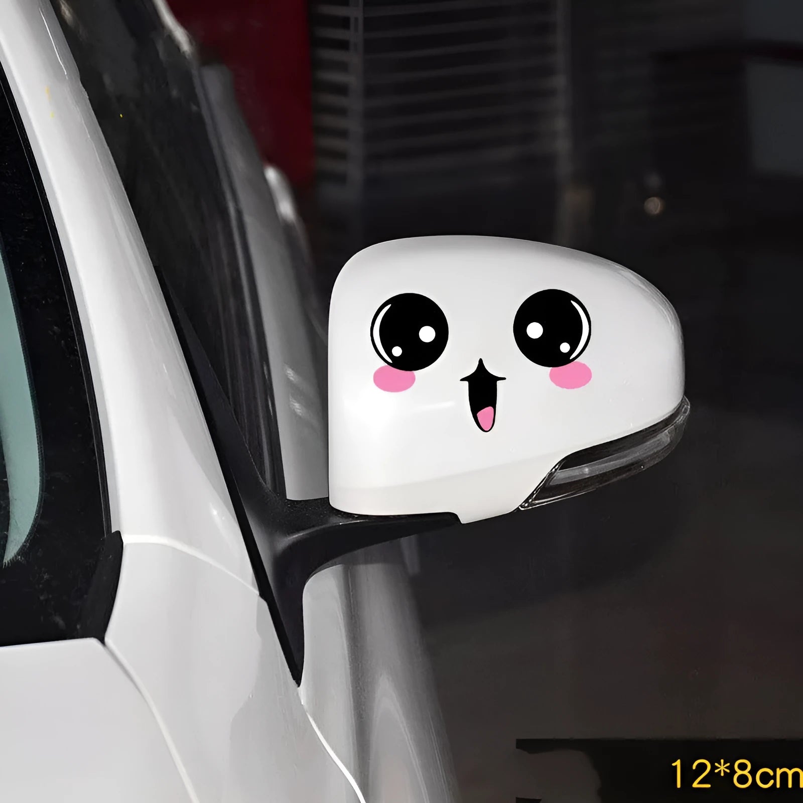 A pair of reflective cartoon eye car stickers made from PET vinyl, designed for vehicle body or rearview mirror.