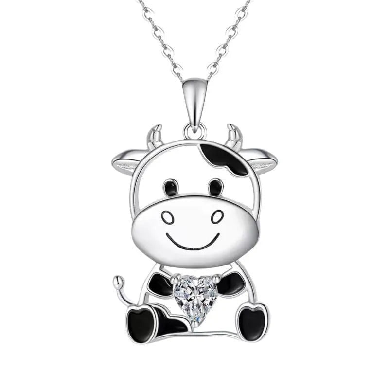 Silver alloy children's necklace with cartoon cow pendant and heart-shaped gem on O-shaped chain