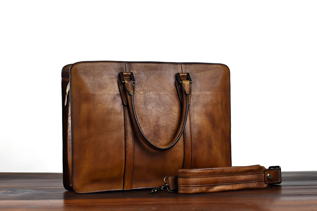 Men's brown leather handbag with horizontal square design and zipper closure