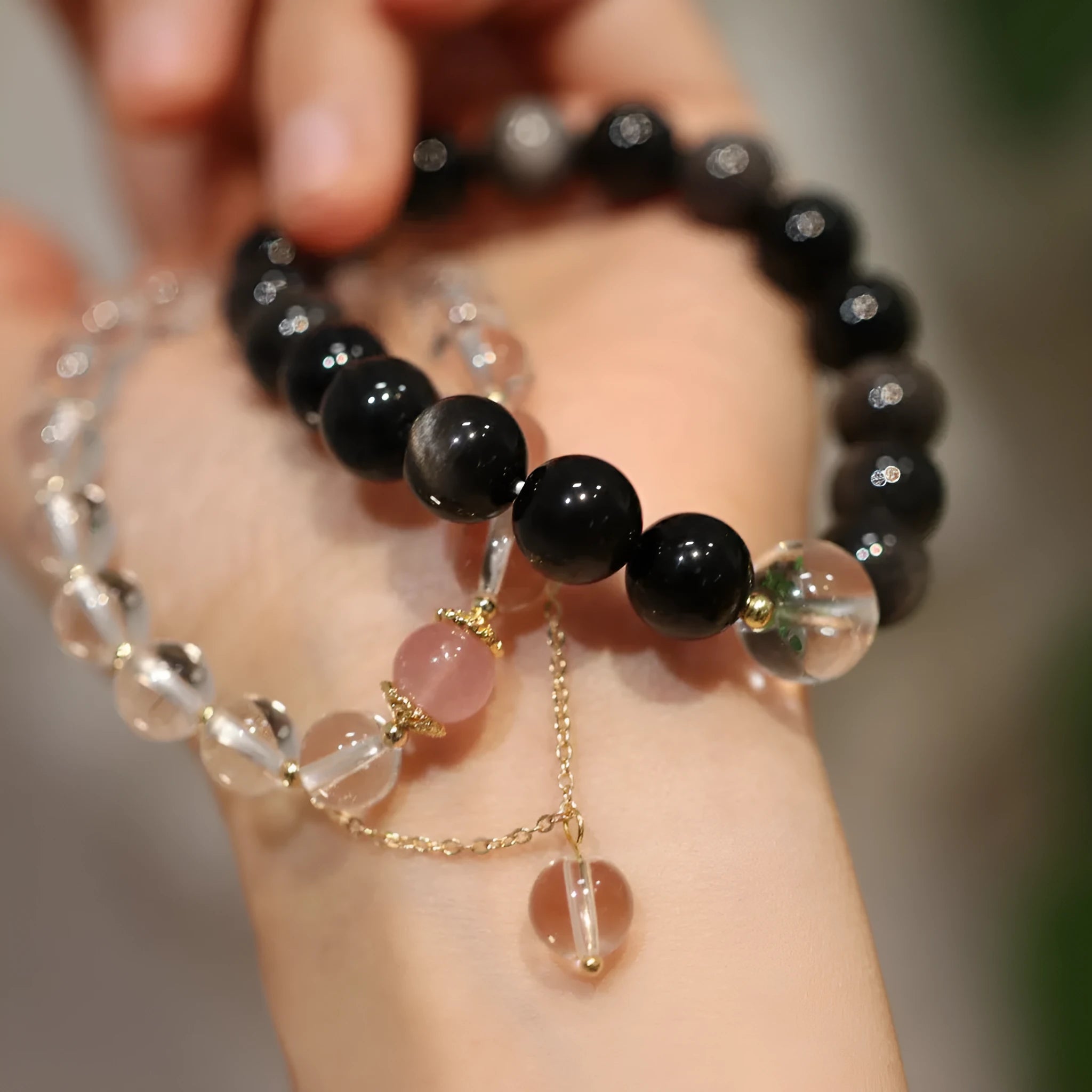 White and pink cat eye obsidian crystal bracelet with geometric Chinese patterns