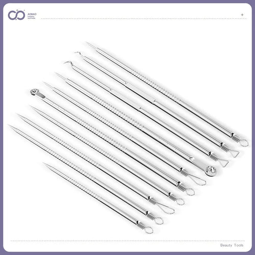Four silver metal acne needles with ultra-fine pointed tips arranged on a clean surface.