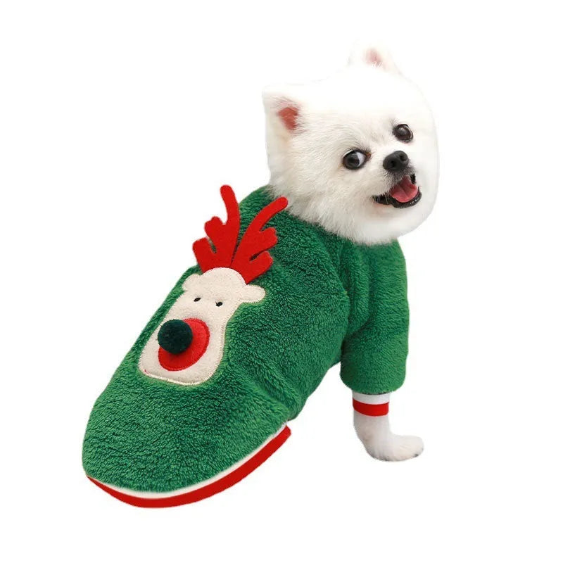 Red coral fleece dog sweater with reindeer hoodie on a small dog over a festive background