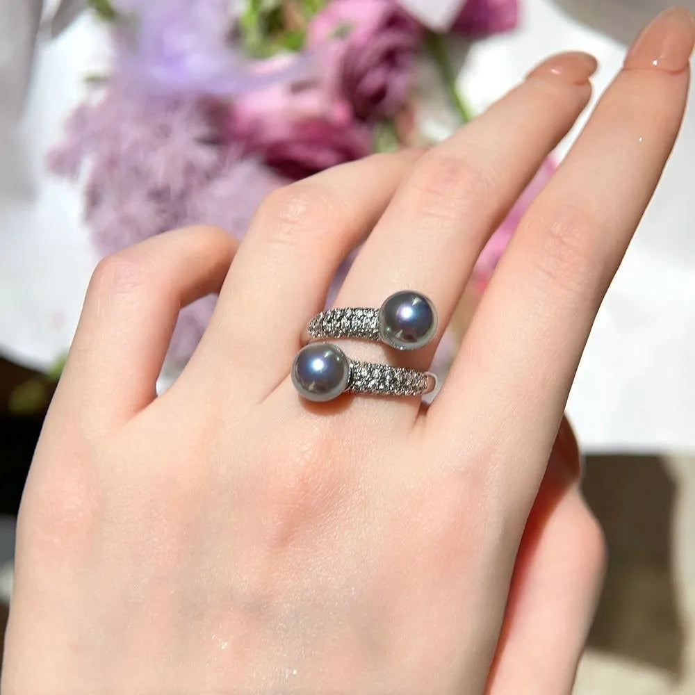 Twist plate geometric ring with white shell pearl and inlaid zircon accents