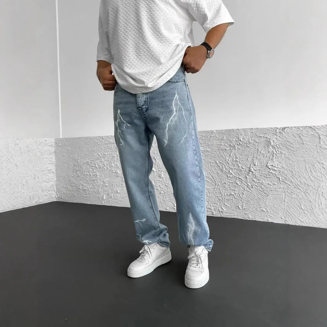 Men's straight-leg denim jeans with mid-waist design showing front view