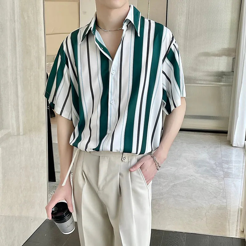 Loose casual ruffian handsome top in green with pointed collar, yarn-dyed fabric