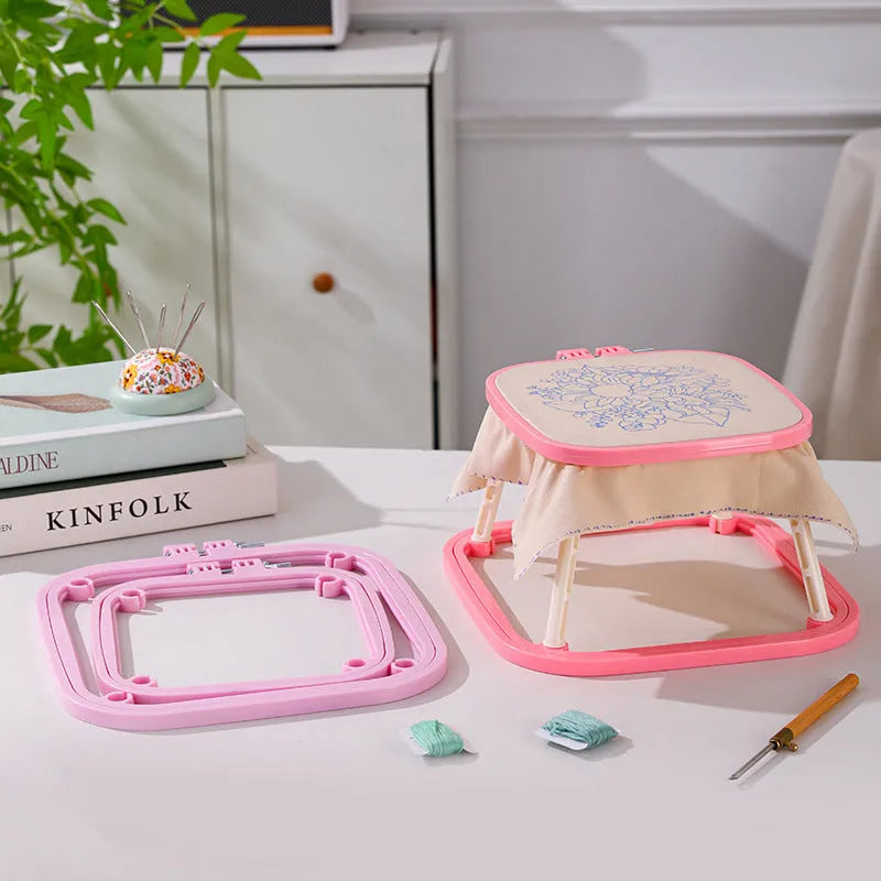 French desktop embroidery frame with adjustable double-layer ABS design in light purple on a table