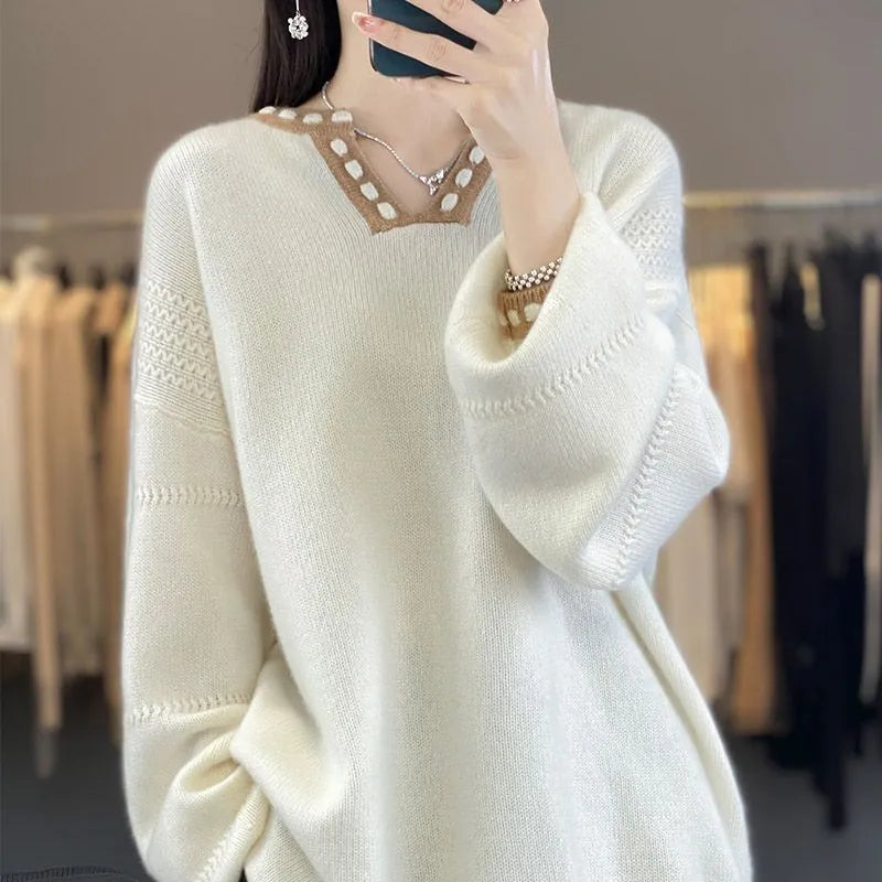 Women's camel V-neck viscose pullover sweater with long sleeves laid flat.