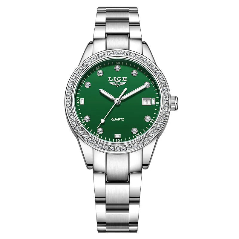 Silver stainless steel women's watch with diamond-encrusted bezel and luminous hands on a 34mm round dial.