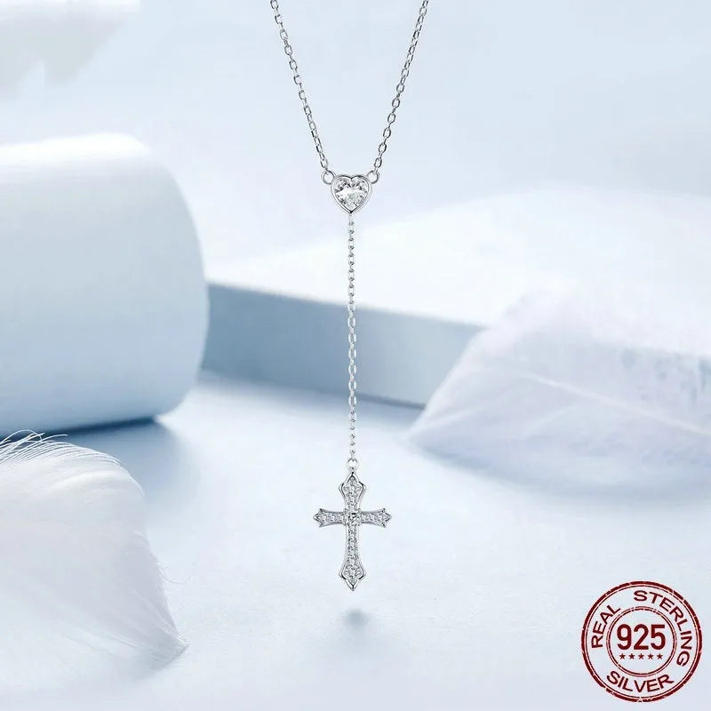 Simple silver cross necklace with V-neck and O-ring chain in colour BSN384.