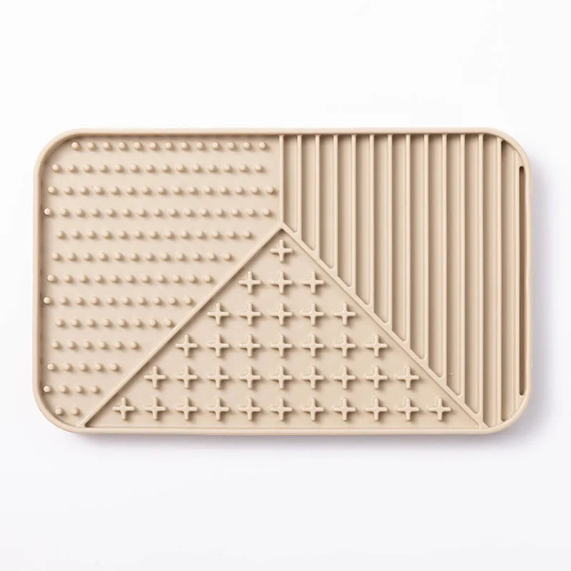 Silicone pet licking mat with suction cup backing in pink, grey and khaki colours