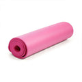 Widened NBR non-slip yoga mat 183x61cm in black rolled out on floor with purple options