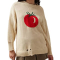 Beige women's loose-fitting acrylic jacquard knit sweater with round neck and long sleeves.