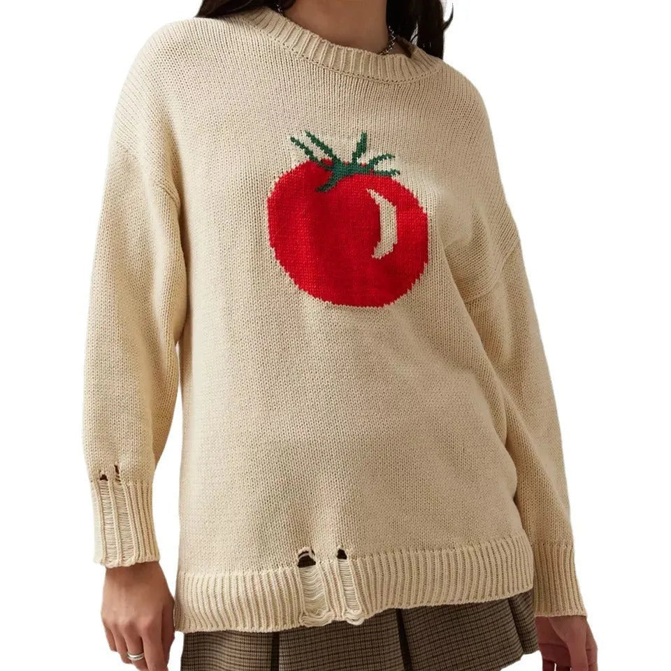 Beige women's loose-fitting acrylic jacquard knit sweater with round neck and long sleeves.