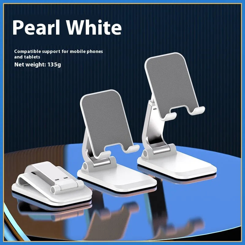 Foldable universal phone holder in black or white for bedside and desktop use