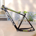 Black green aluminium mountain bike frame for 29-inch wheels with internal cable routing and disc brake mount.