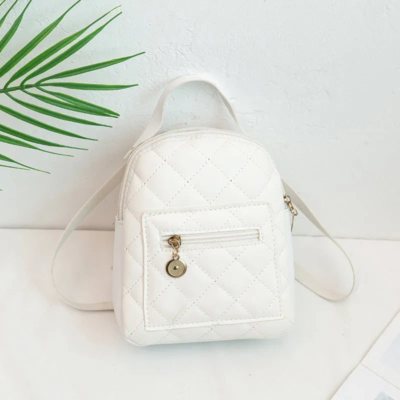 Girls' hard square PU backpack with embroidery in black, white, or pink, showing front and handle.