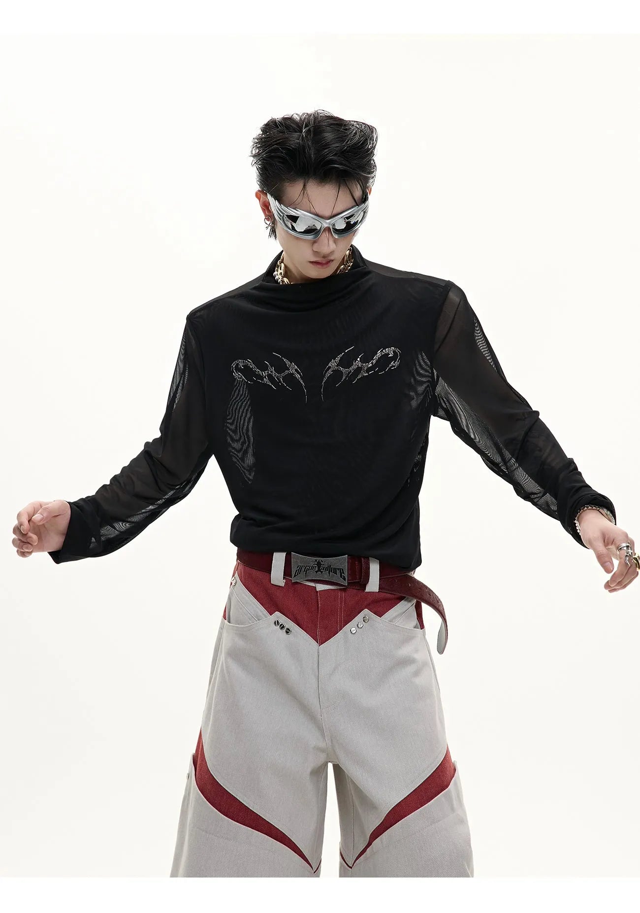 Black slim long sleeve mesh bottoming shirt on a hanger showing its fit and fabric texture.