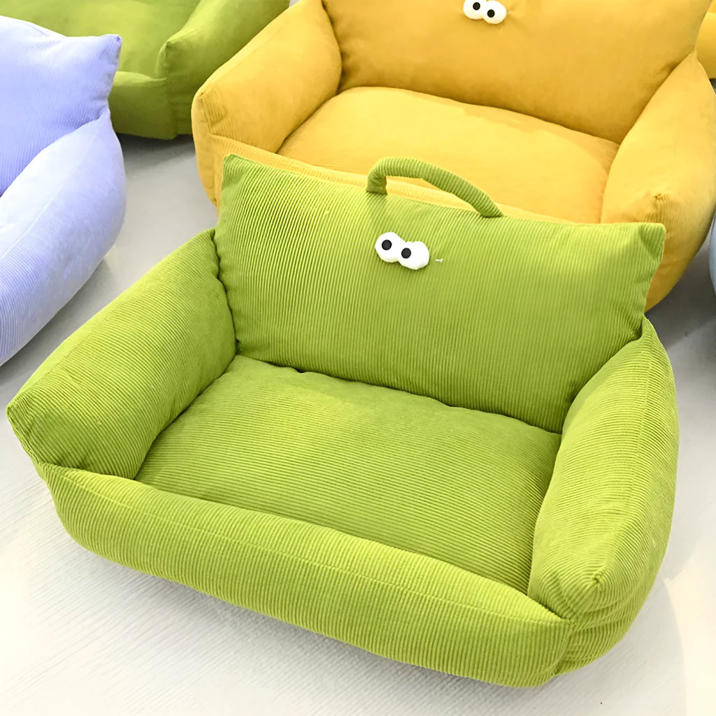 Blue cartoon big eye pet nest bed for small dog or cat on a sofa