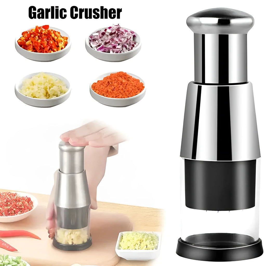 Manual garlic crusher and onion chopper in black with stainless steel blades on a kitchen counter