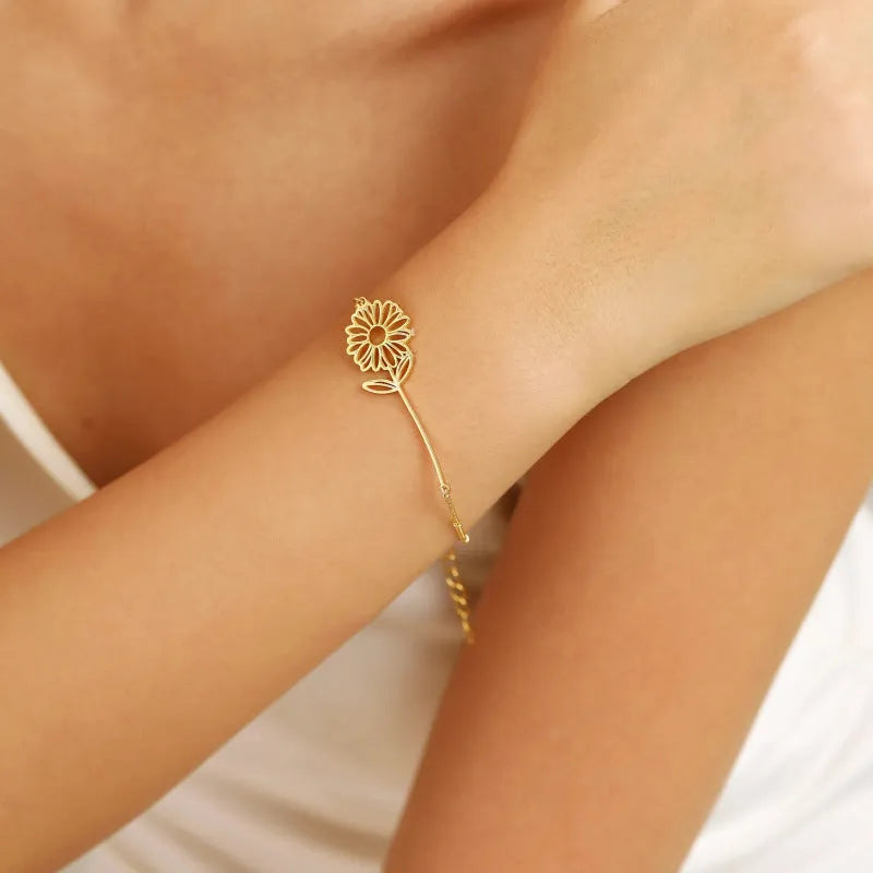 Titanium steel bracelet with May Bell blue lily flower pendant and electroplated finish