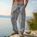 Men's loose-fitting cotton wide-leg casual trousers in a light army green colour.
