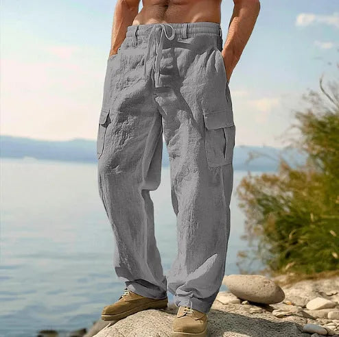 Men's loose-fitting cotton wide-leg casual trousers in a light army green colour.