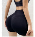 Women's high-waist yoga shorts in quick-dry fabric for fitness workouts