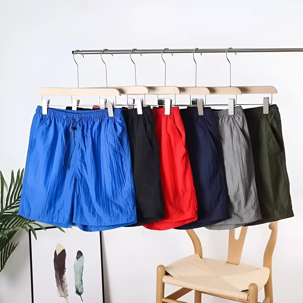 Men's straight-leg quick-drying sports shorts in chemical fibre blend fabric