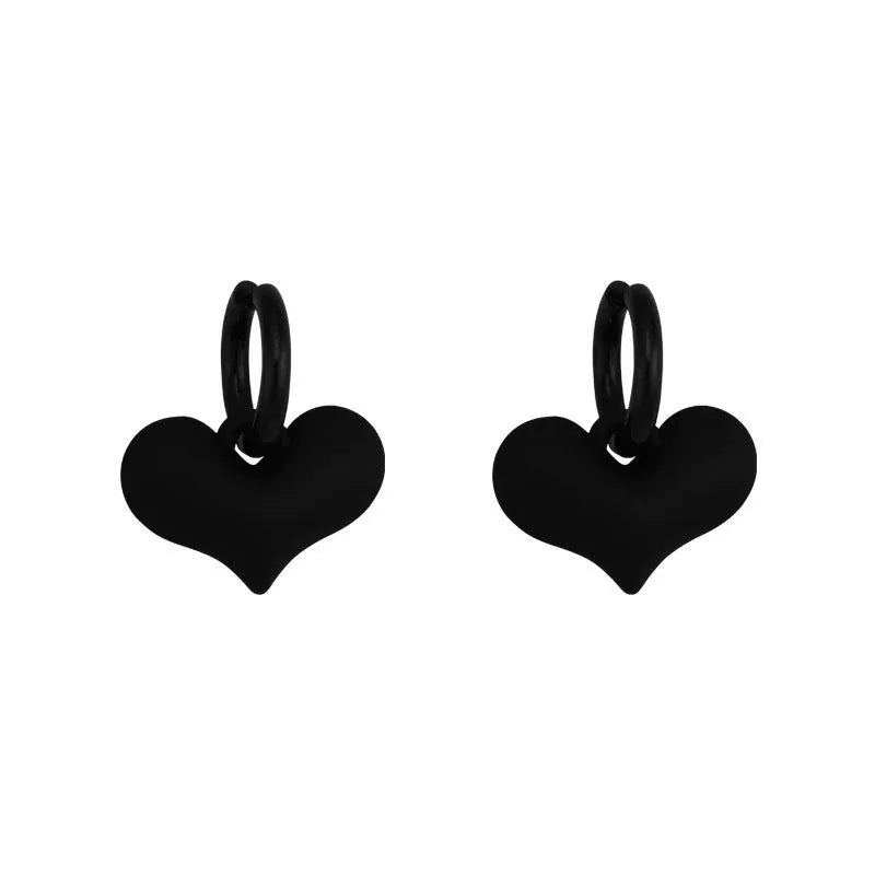 Black heart-shaped earrings with glass inlay in Korean style, shown as one pair