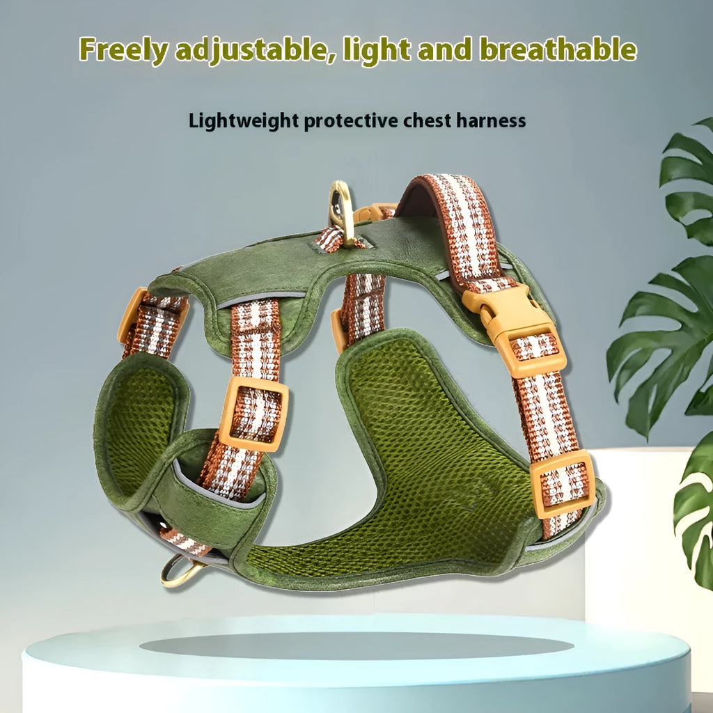 Brown leather dog harness with reflective strips and chest clip.