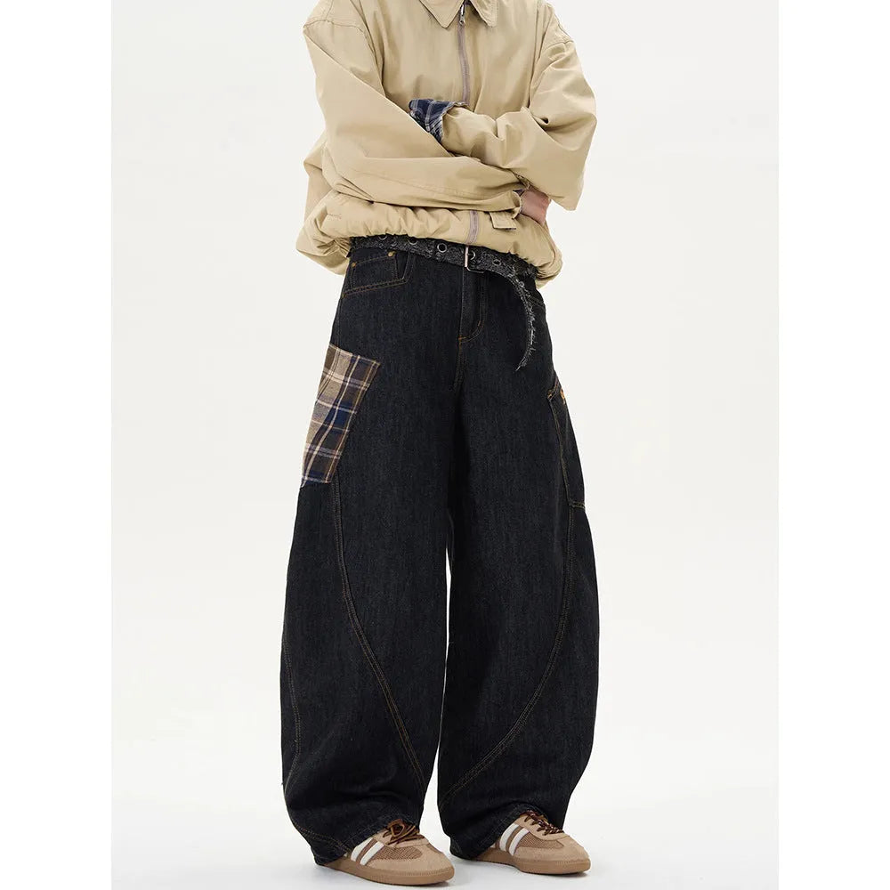 Loose straight-leg cotton trousers in a red plaid pattern, showing mid waist and casual fit.