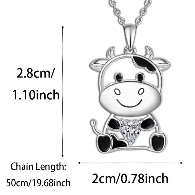 Silver alloy children's necklace with cartoon cow pendant and heart-shaped gem on O-shaped chain