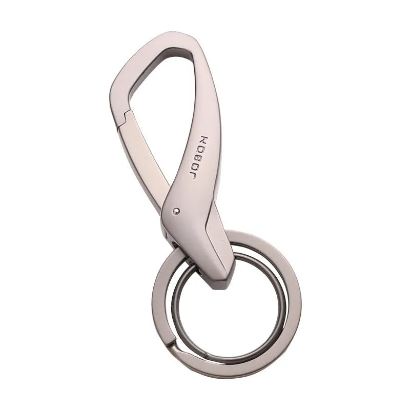 Simple Creative zinc alloy double-ring key chain in black, shown attached to a car key and a belt loop.