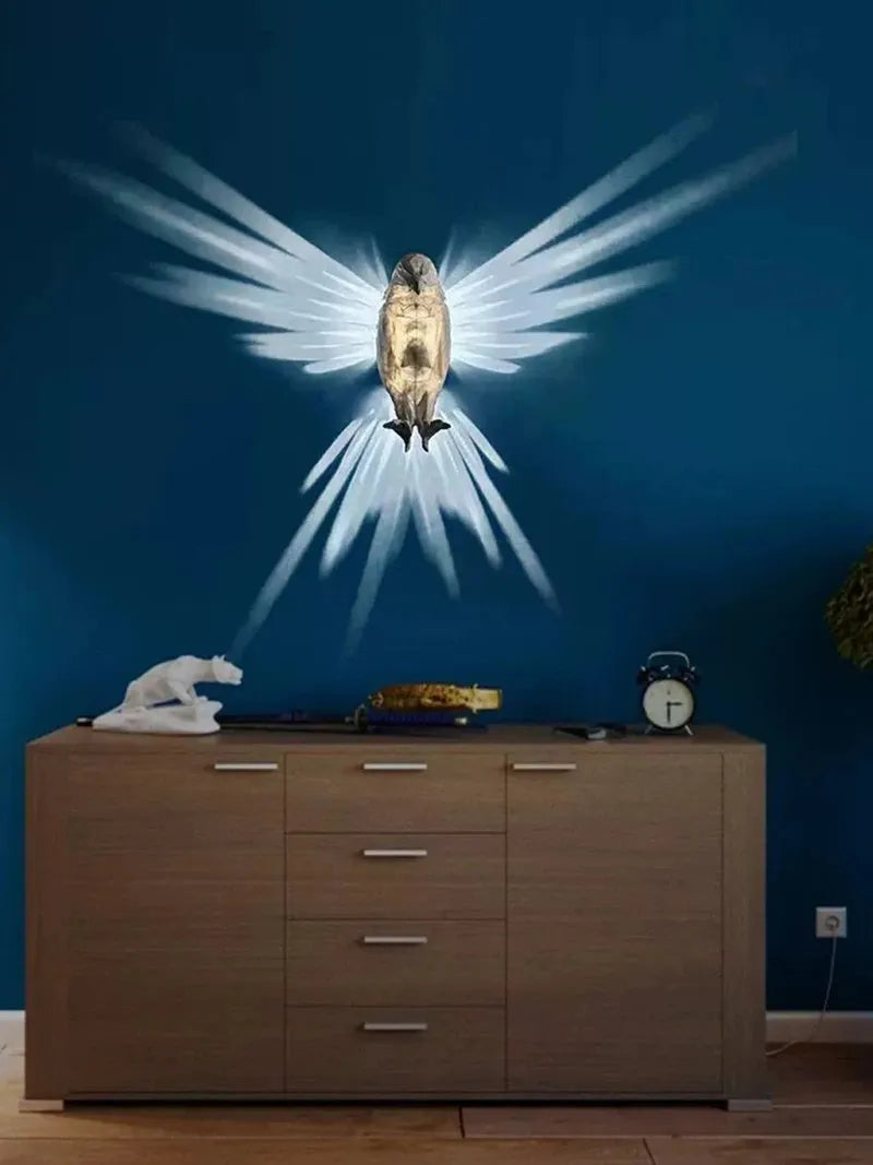 3D printed eagle silhouette wall lamp with multicoloured projection lighting on wall