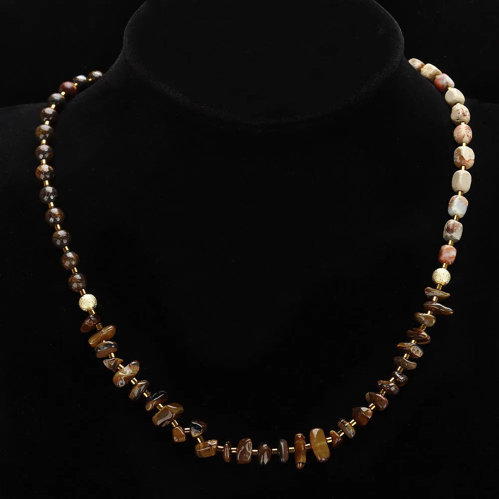 Tigereye stone and bronze geometric bracelet with texture details and bends design