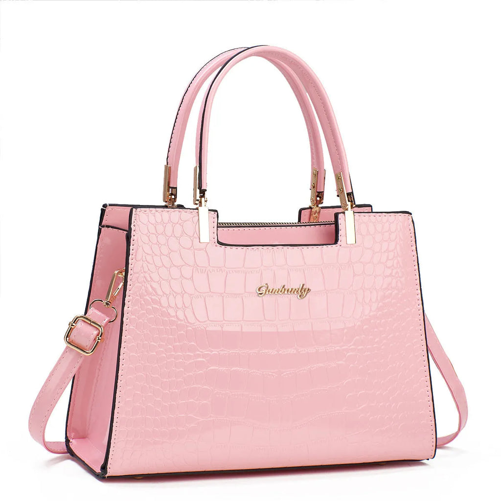 Square-shaped one-shoulder PU leather handbag in medium-hard construction showing colour options.