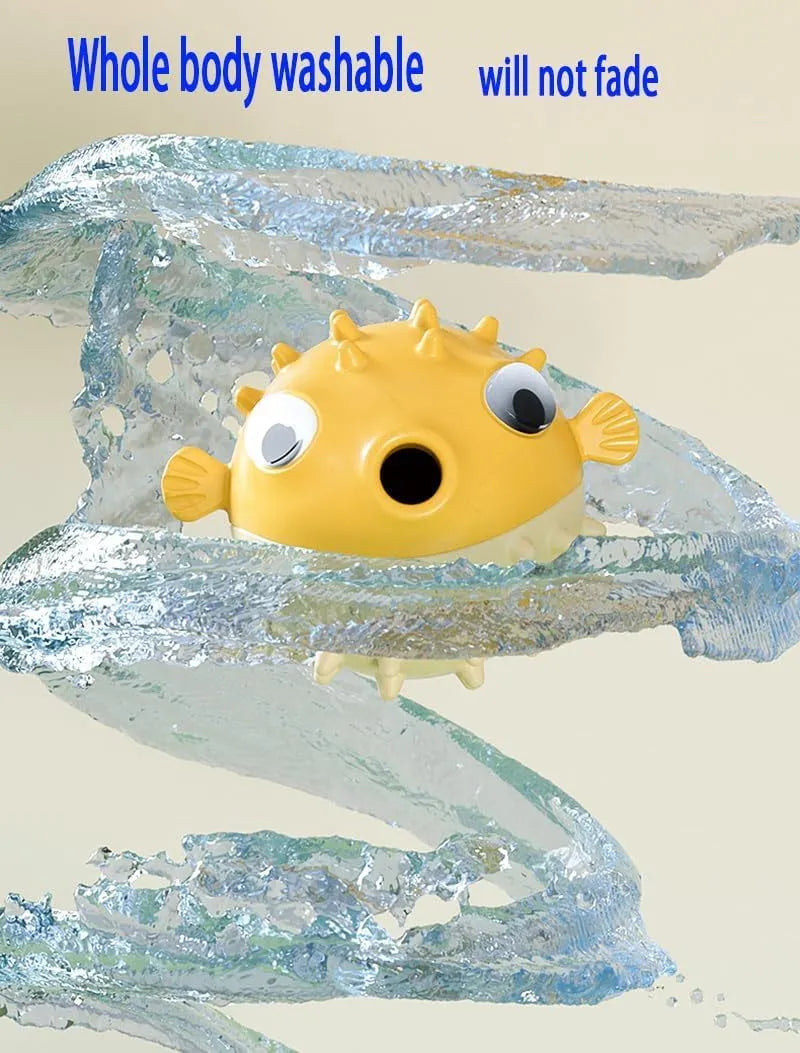 Green fish-shaped interactive dog toy with treat hole and textured surface, shown next to dog treats.