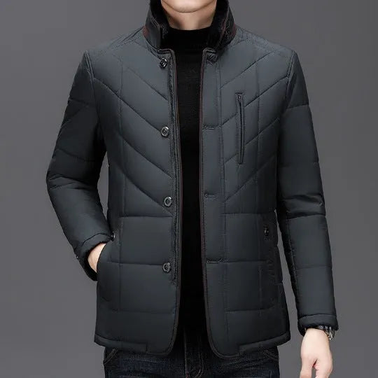 Men's solid colour winter coat with side pockets in dark blue, shown on a hanger.