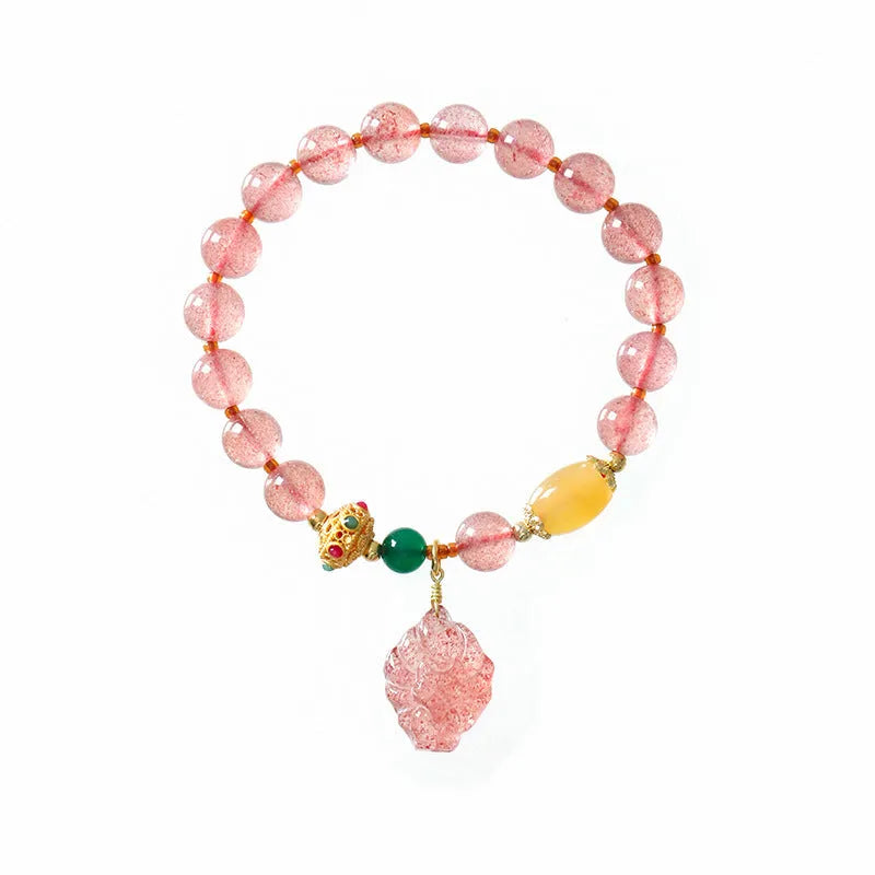 Women's strawberry quartz crystal bracelet with nine tail fox bead design