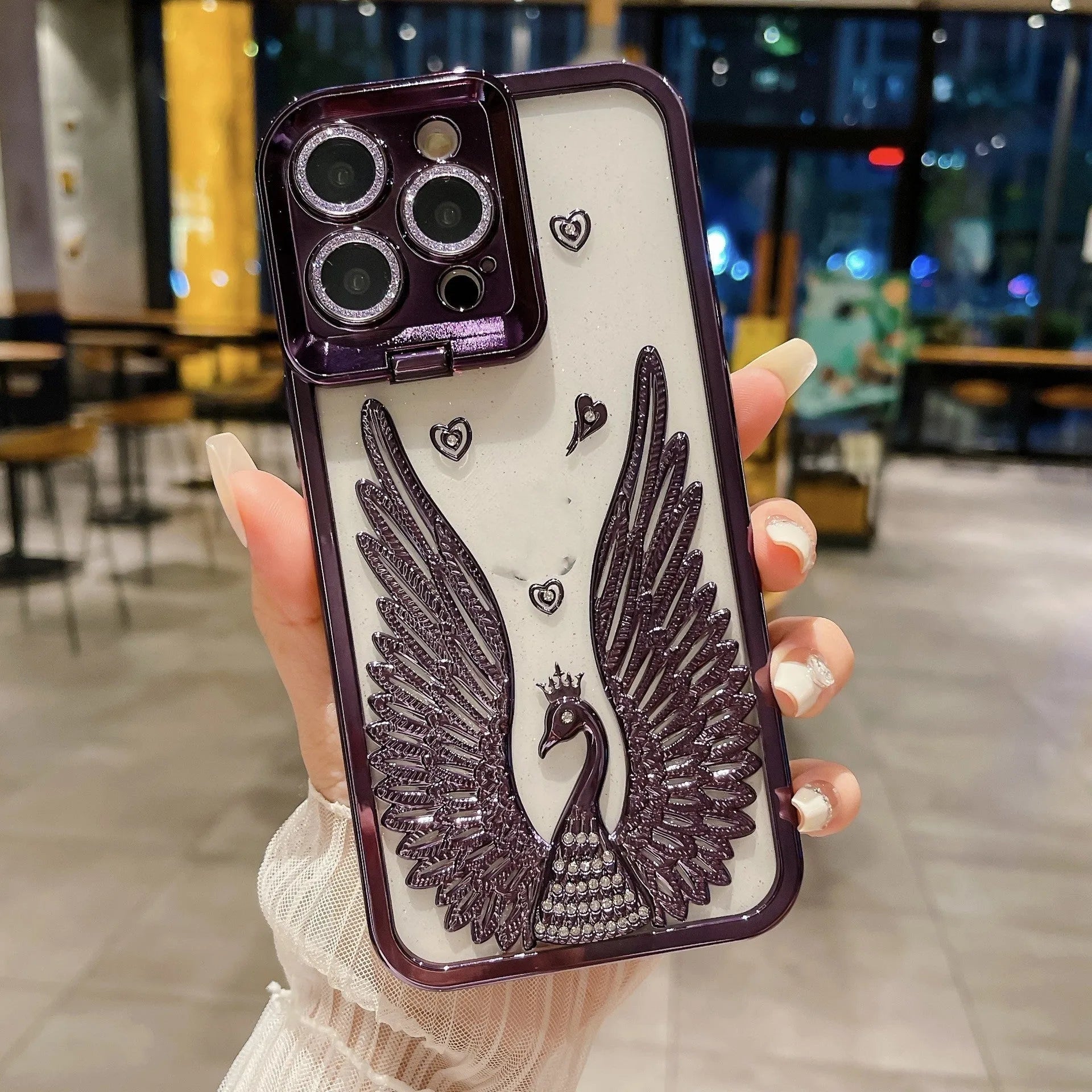 Angel wing frame bracket electroplated TPU phone case in transparent black for iPhone 15 Pro Max with built-in stand